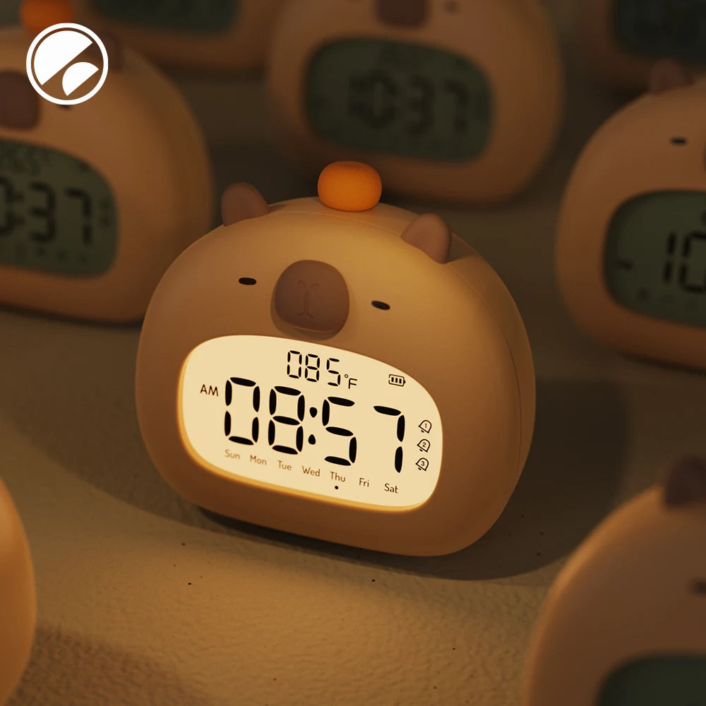 Cute brown animal-shaped kawaii digital clock with a digital display on a dark background.