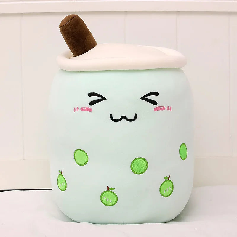 Cute kawaii plush toy resembling a bubble tea with a smiling face on a white background