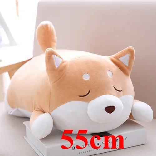 Plush dog kawaii toy on a book with '55cm' text, sitting on a light-colored surface.