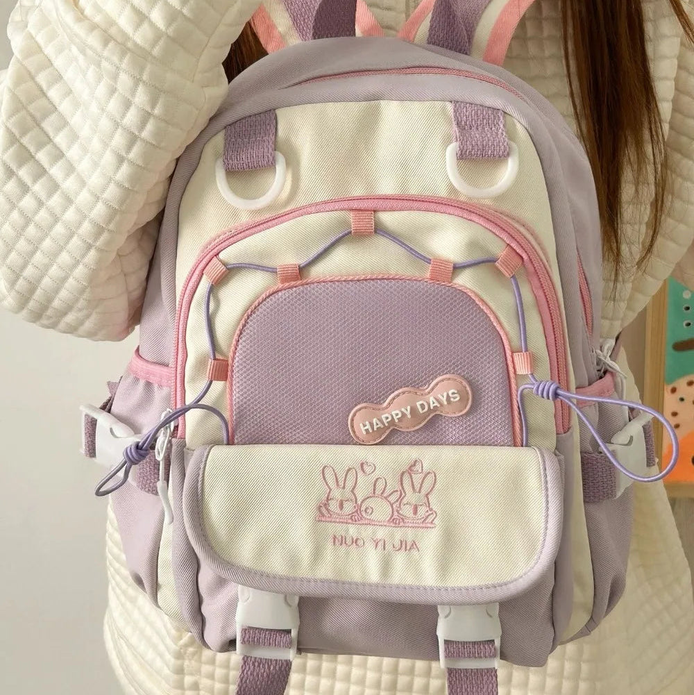 Pastel-colored Kawaii backpack with a visible brand logo on a neutral background