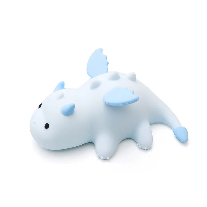 White and blue kawaii cartoon-like creature on a white background