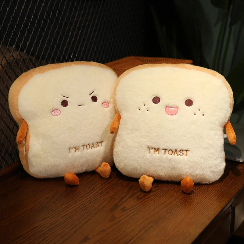 Two plush kawaii toys shaped like slices of bread with cartoon faces on a wooden surface.