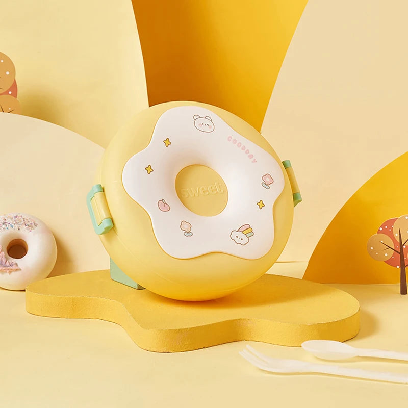 Yellow kawaii donut-shaped product with cartoon designs on a yellow background