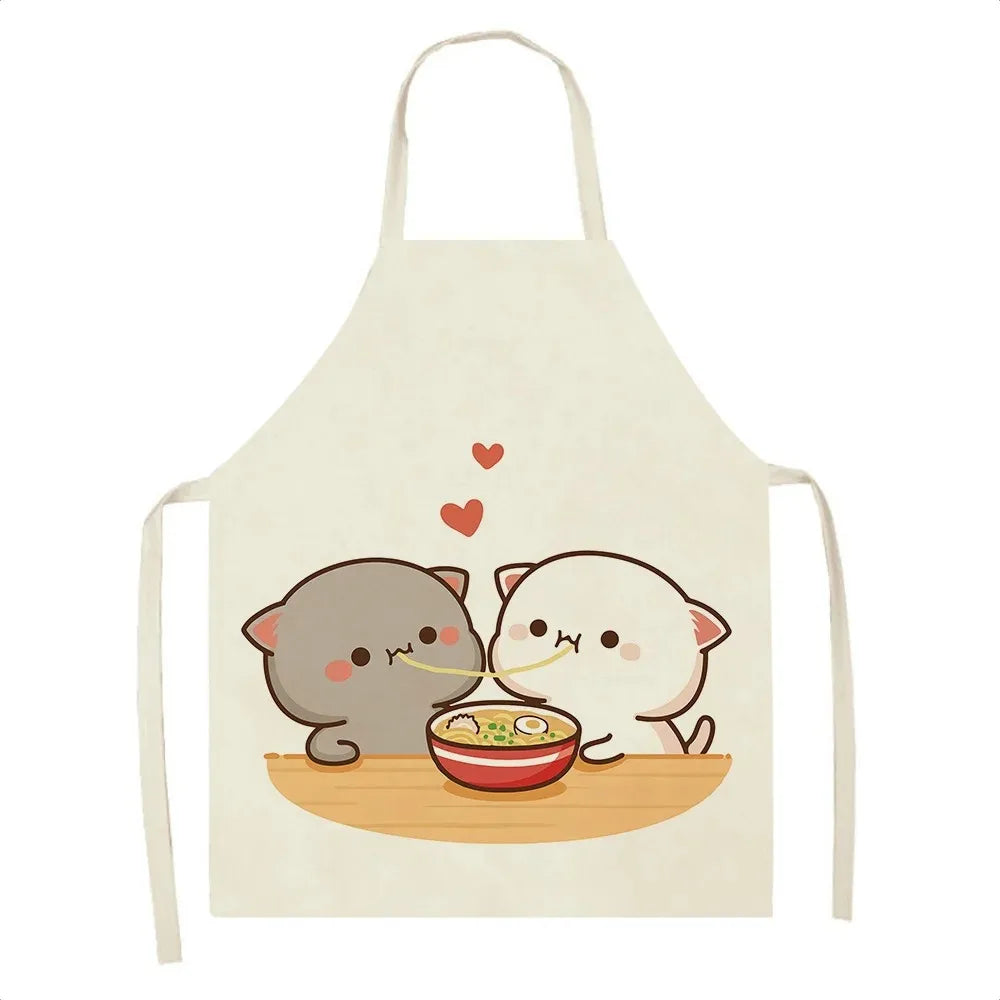 Beige apron with Kawaii cartoon cats eating soup design on a white background