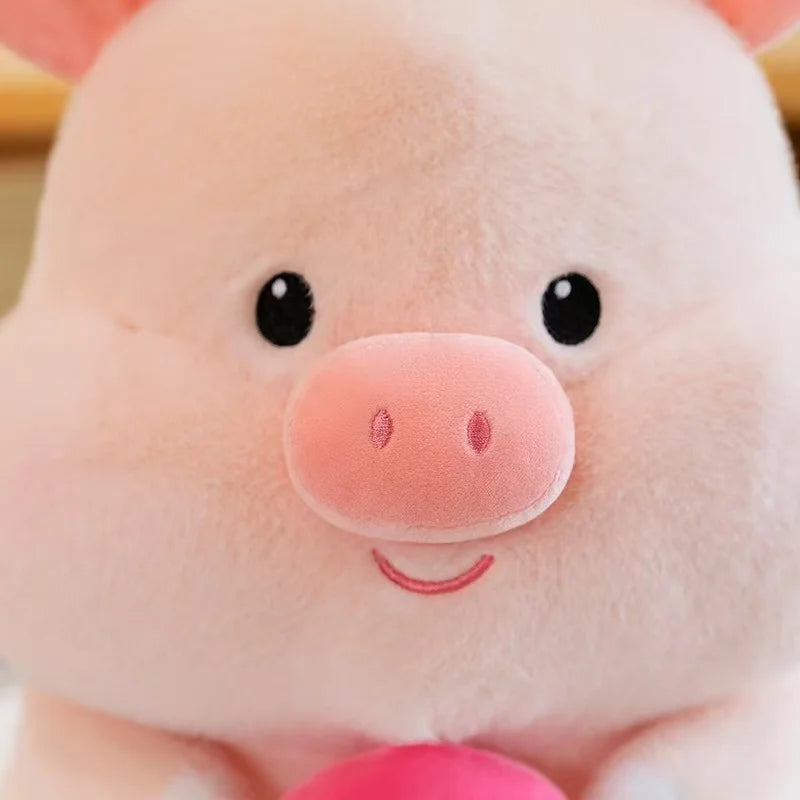 Close-up of a kawaii plush toy pig with a soft focus background