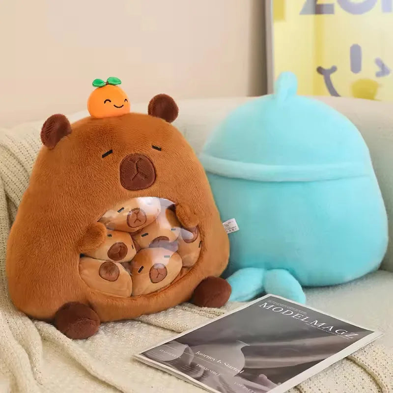 Kawaii plush animal toy resembling a bear with smaller toys inside, next to a blue lamp on a couch.
