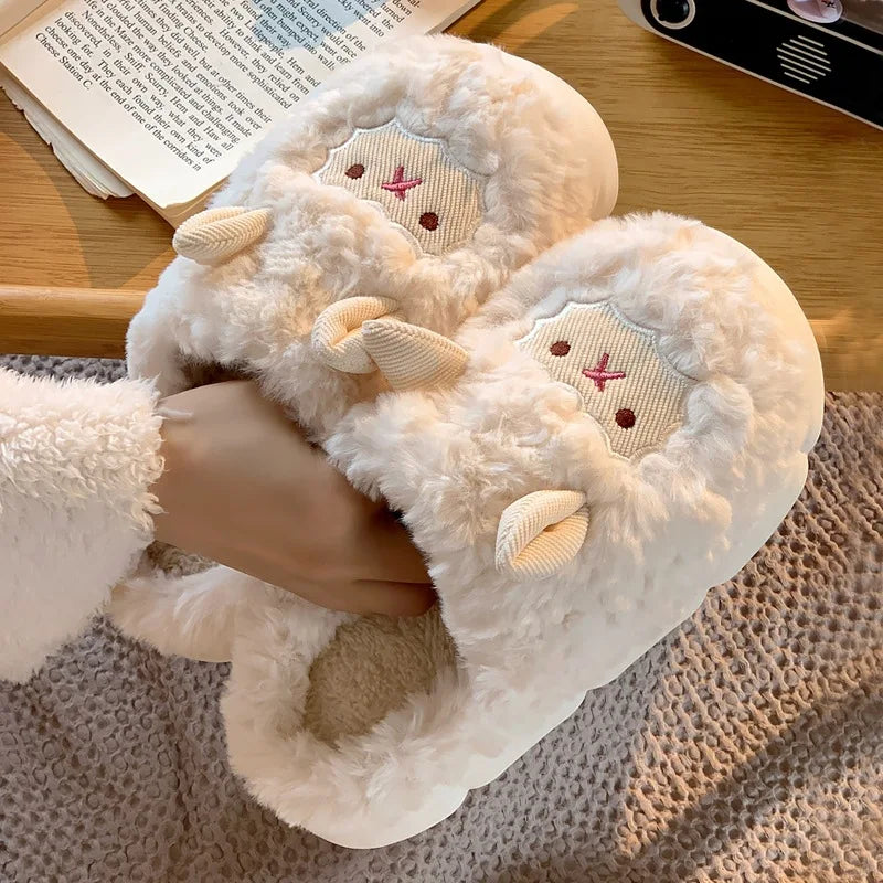 White fluffy slippers with kawaii cartoon face design worn by a person, on a textured surface.