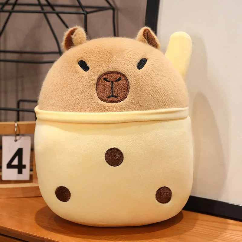 Kawaii plush toy with bear design on a wooden surface