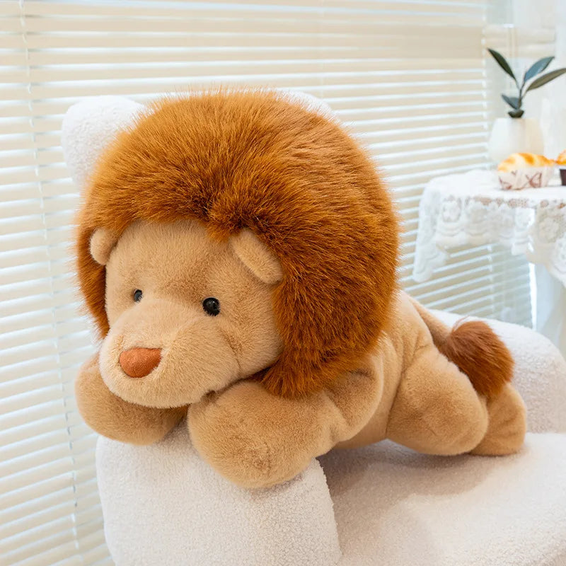 Plush kawaii lion toy sitting on a white surface with a blurred background