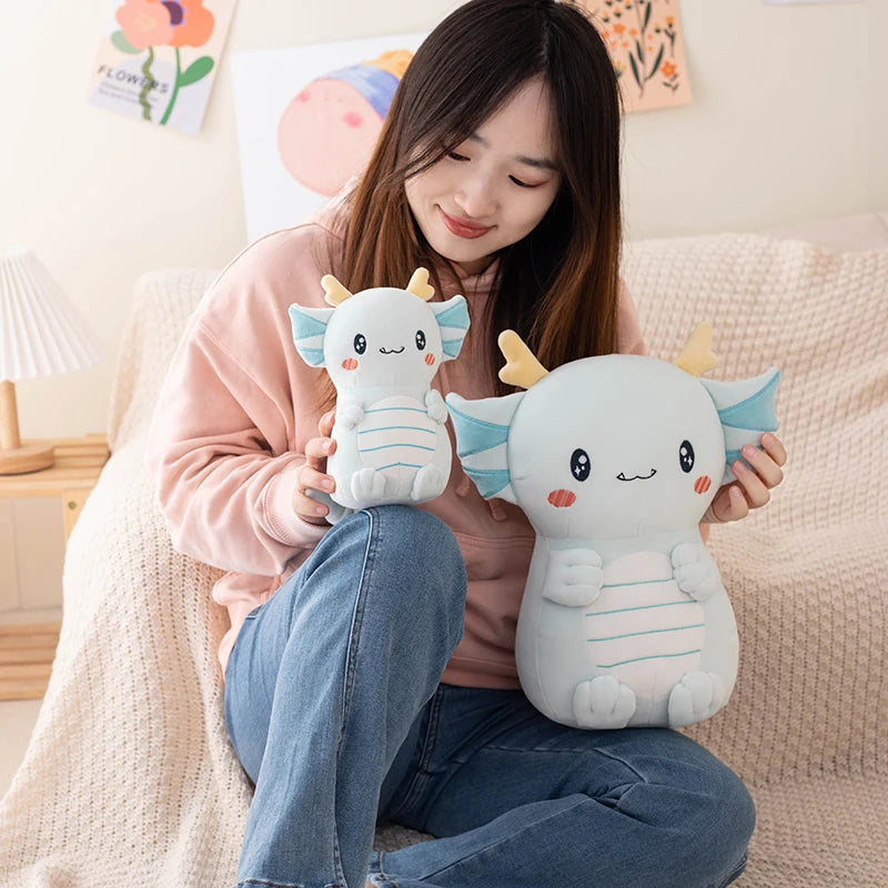 Woman holding two cute kawaii  plush toys in a cozy living room.