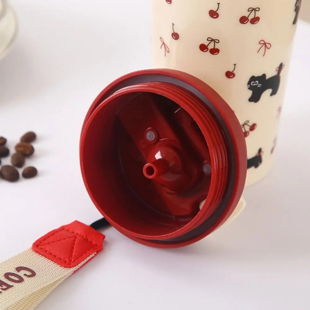 Red coffee filter with a beige container featuring Kawaii cherry designs on a white background