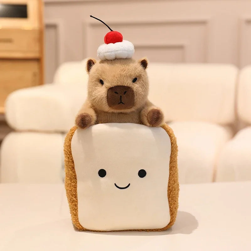 Kawaii plush toy bear with a cake on top of a plush toast pillow on a blurred indoor background
