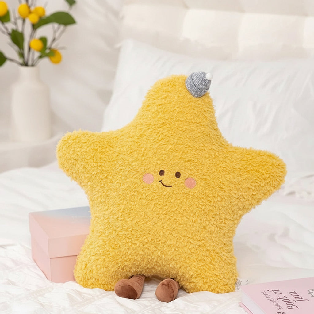 Yellow star-shaped kawaii plush toy with a smiling face on a white surface.