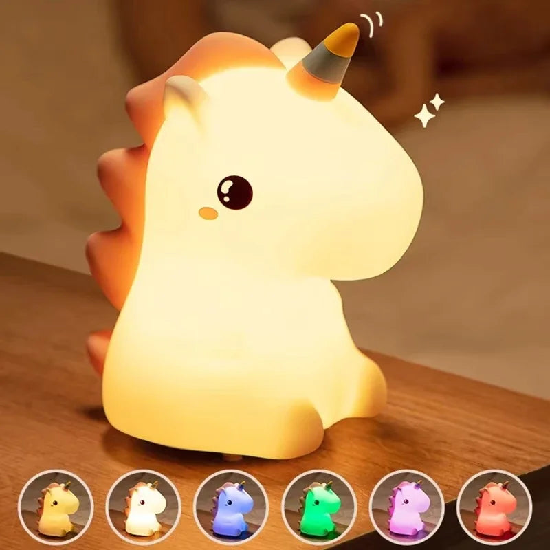 Kawaii unicorn-shaped night light on a wooden surface with color-changing options displayed below.