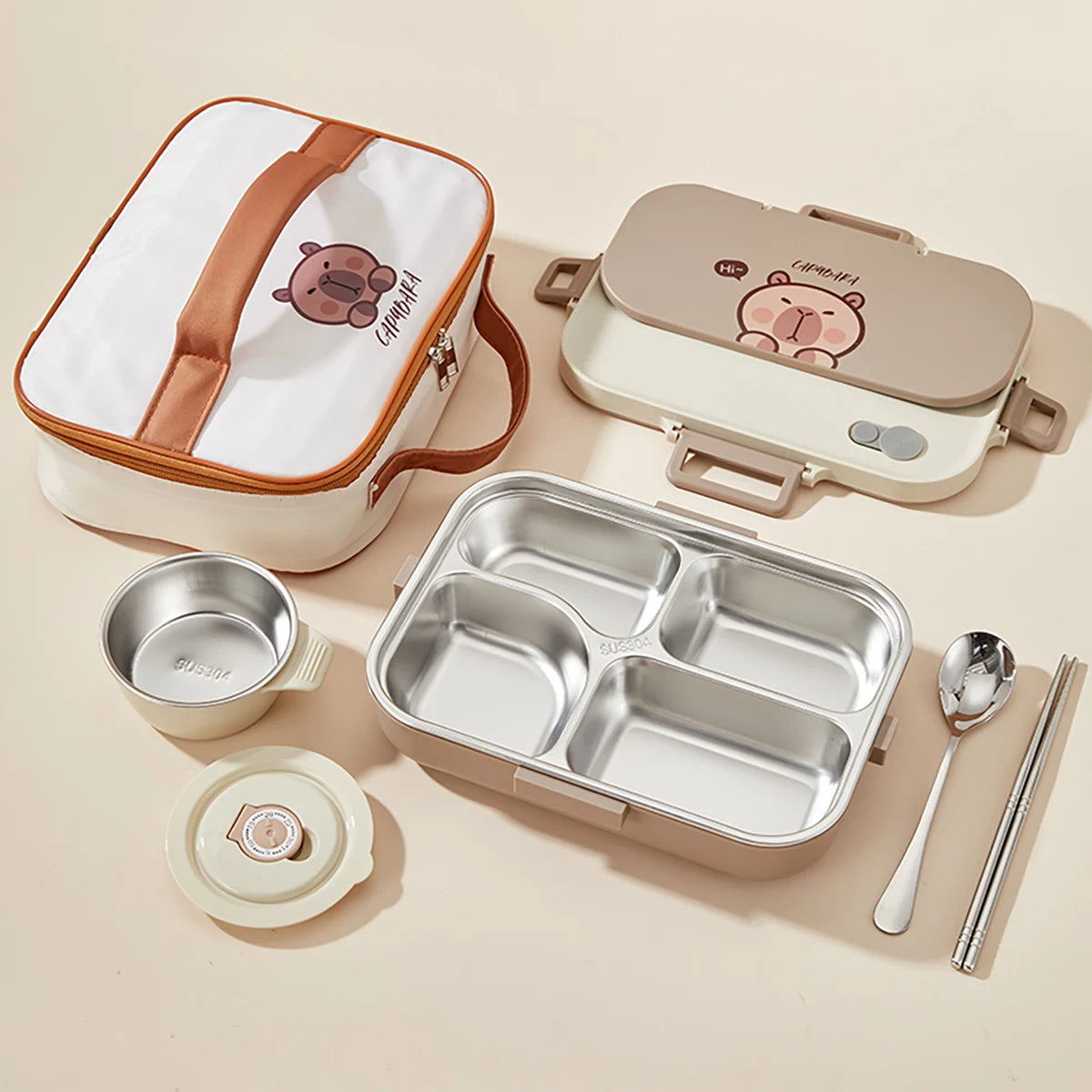 Kawaii-style lunch box set with bear design on a beige background
