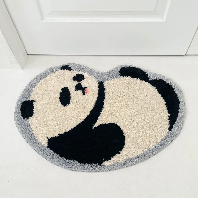 Panda-shaped kawaii rug on a white floor with a door in the background