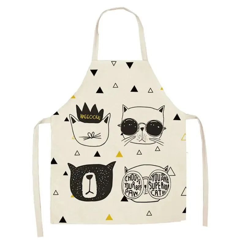 Children's apron with Kawaii cat illustrations and geometric patterns on a white background