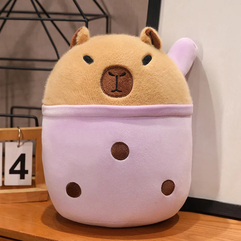 Kawaii plush toy with a cartoonish design on a wooden surface