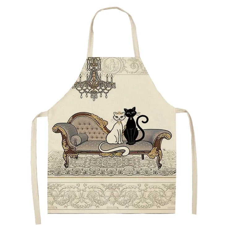 Apron with cats on a couch Kawaii design on a white background