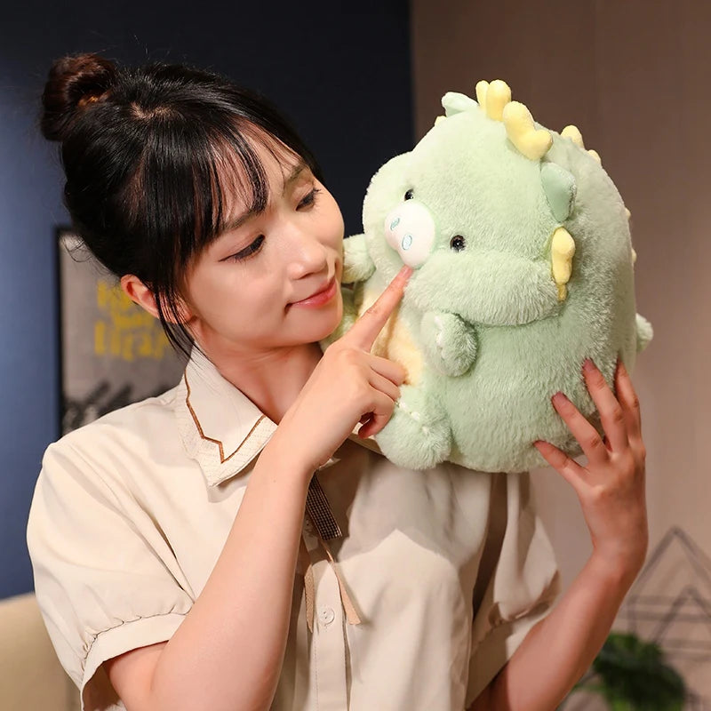Woman holding a kawaii plush toy resembling a dragon