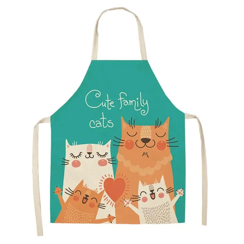 Teal Kawaii apron with cartoon cats and 'Cute family cats' text on a white background