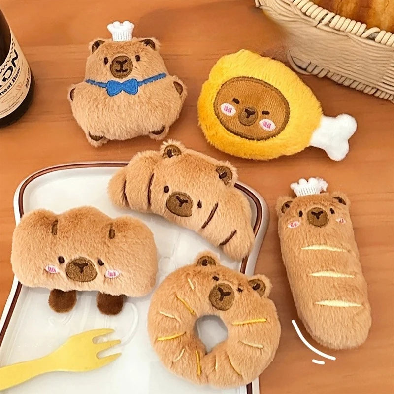 Set of kawaii bear-themed plush toys on a wooden surface