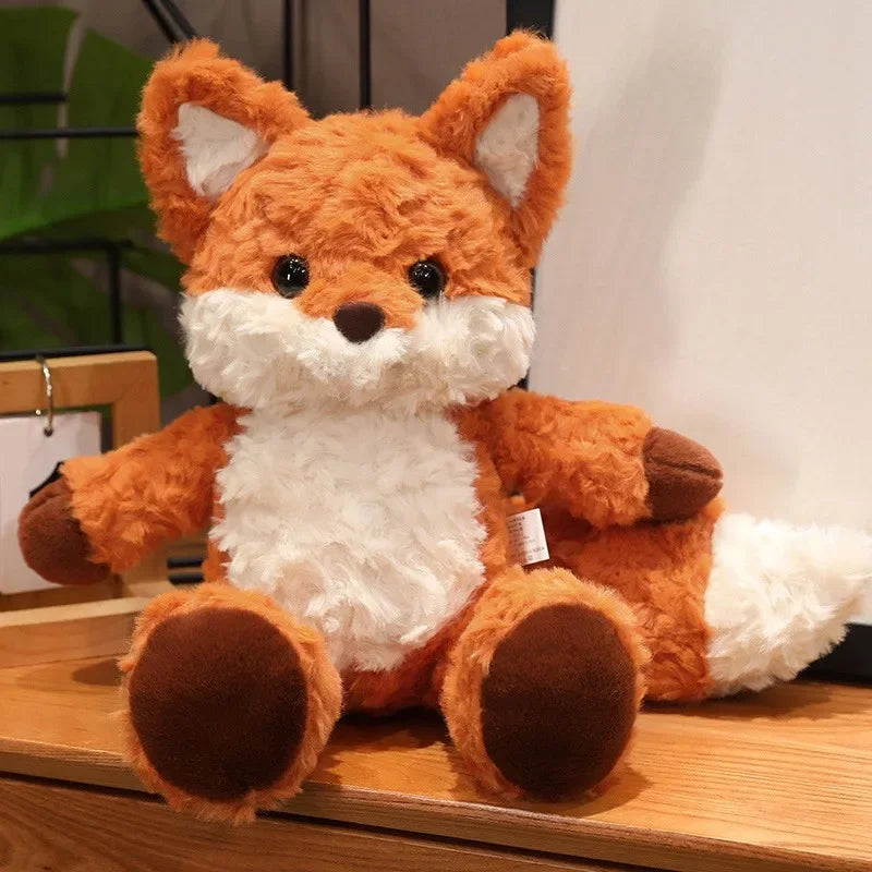 Plush fox kawaii toy on a wooden surface with a neutral background