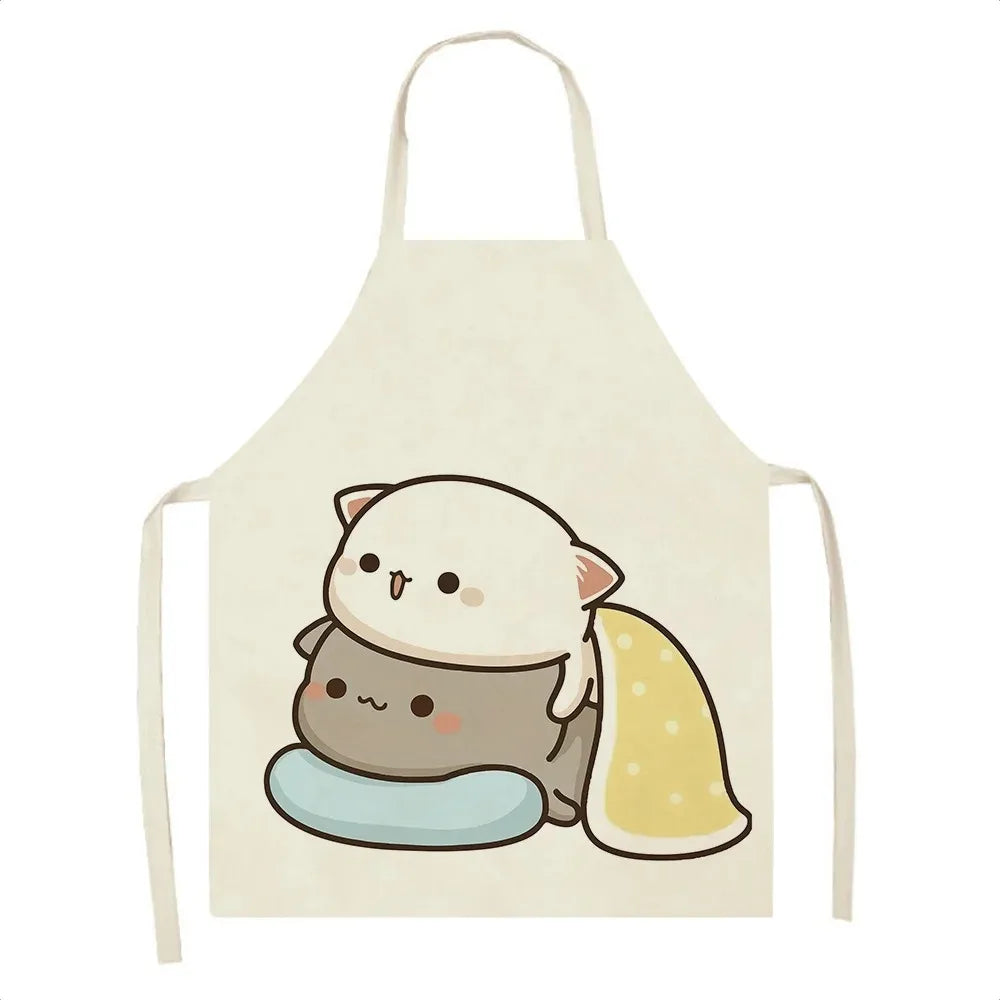 Kawaii-style apron with cartoon cat design on a white background