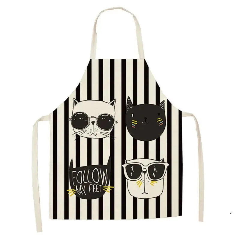 Apron with black and white striped Kawaii pattern featuring cartoon cats wearing sunglasses.