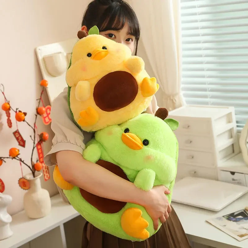 Person holding a large kawaii plush toy resembling a sunflower and duckling in a room.