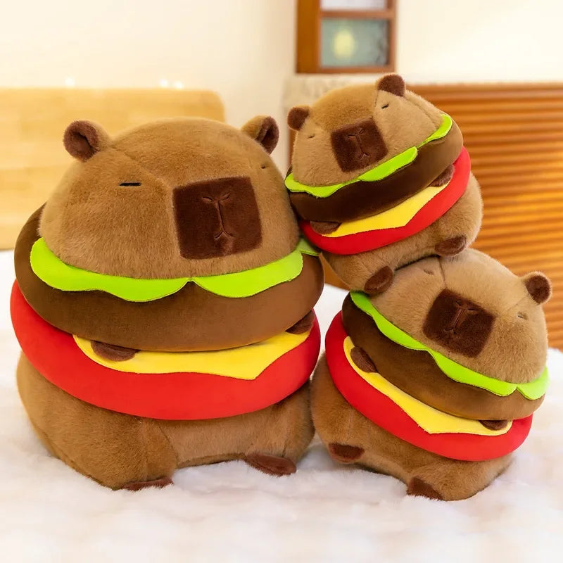 Stack of kawaii plush toys shaped like hamburgers on a white surface with a blurred background