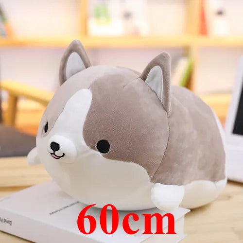 Plush dog kawaii toy with '60cm' text on a blurred indoor background