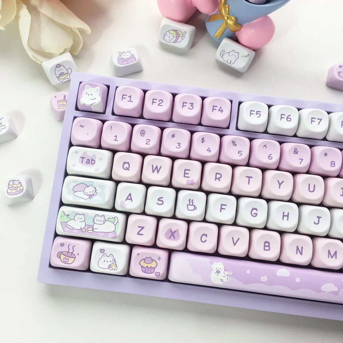 Keyboard with Kawaii keycaps on a light background