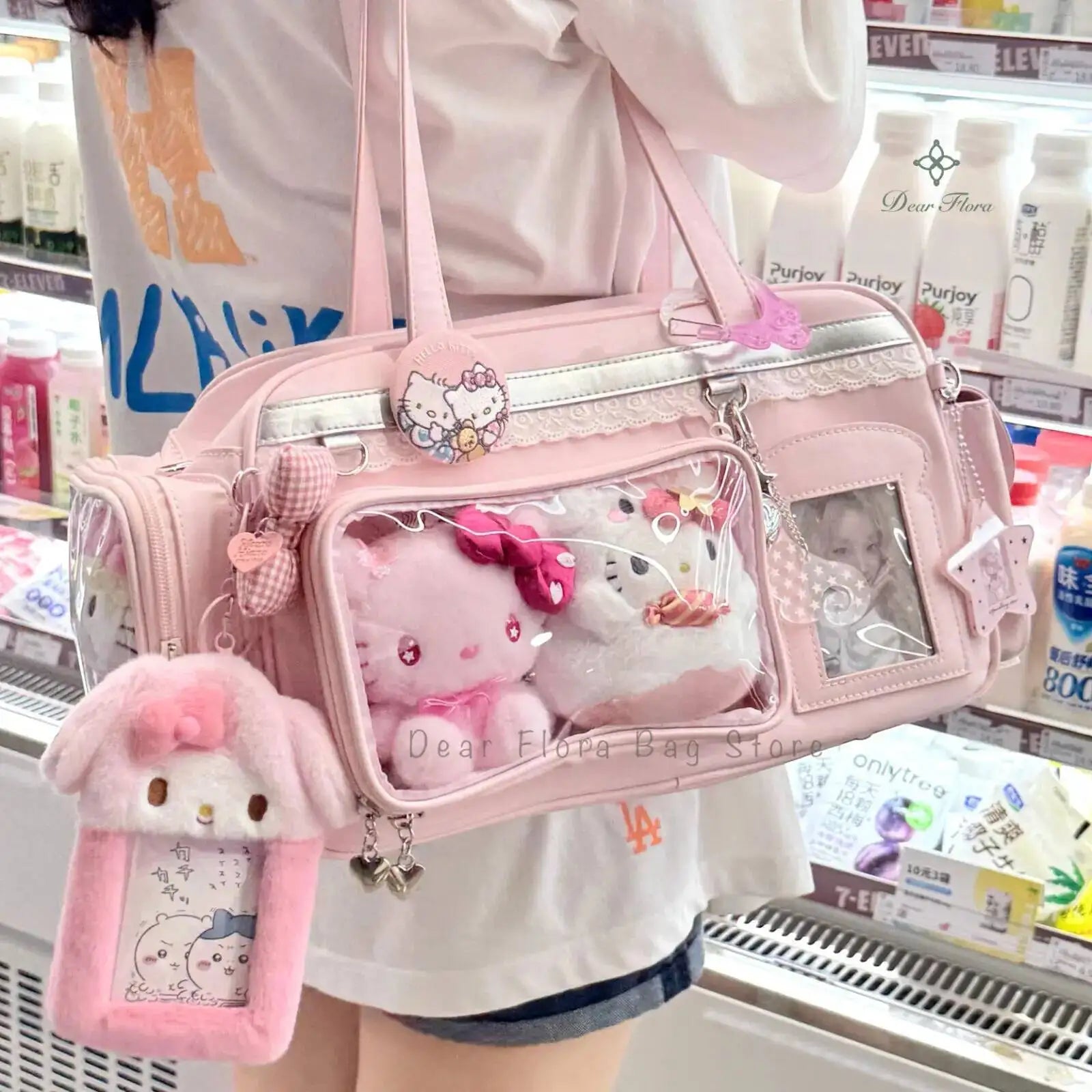 Pink Kawaii bag with plush toy and accessories in a store setting