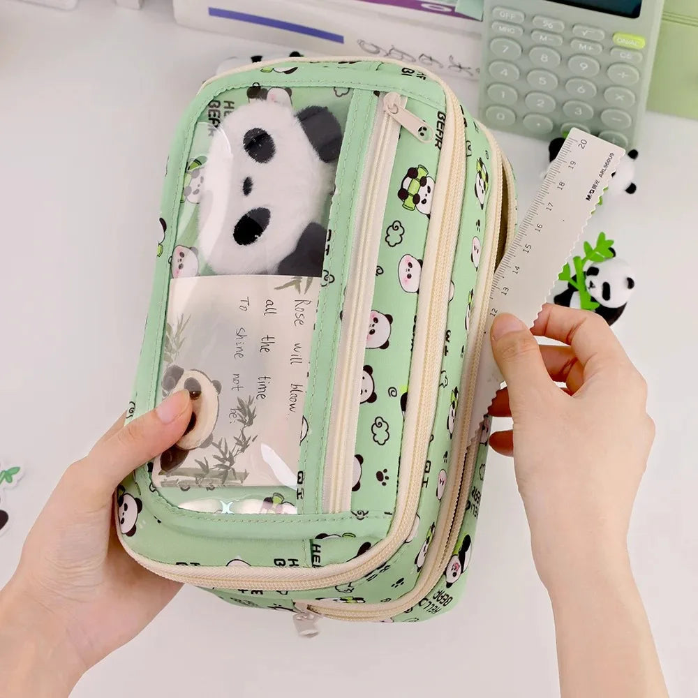 Pencil case with kawaii panda design held by a hand on a light background