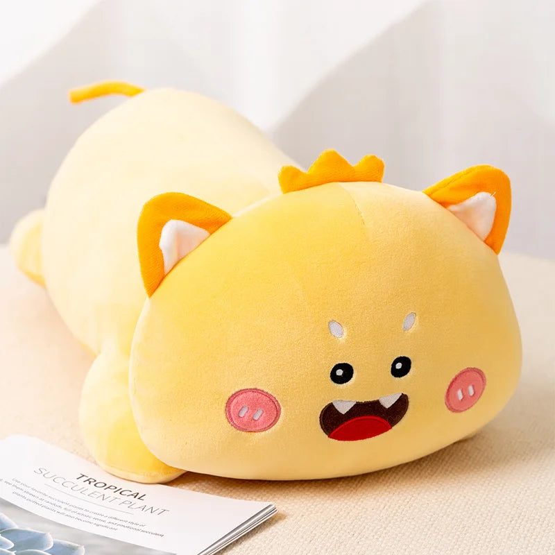 Yellow cartoon-like kawaii plush toy with a surprised expression on a white surface.