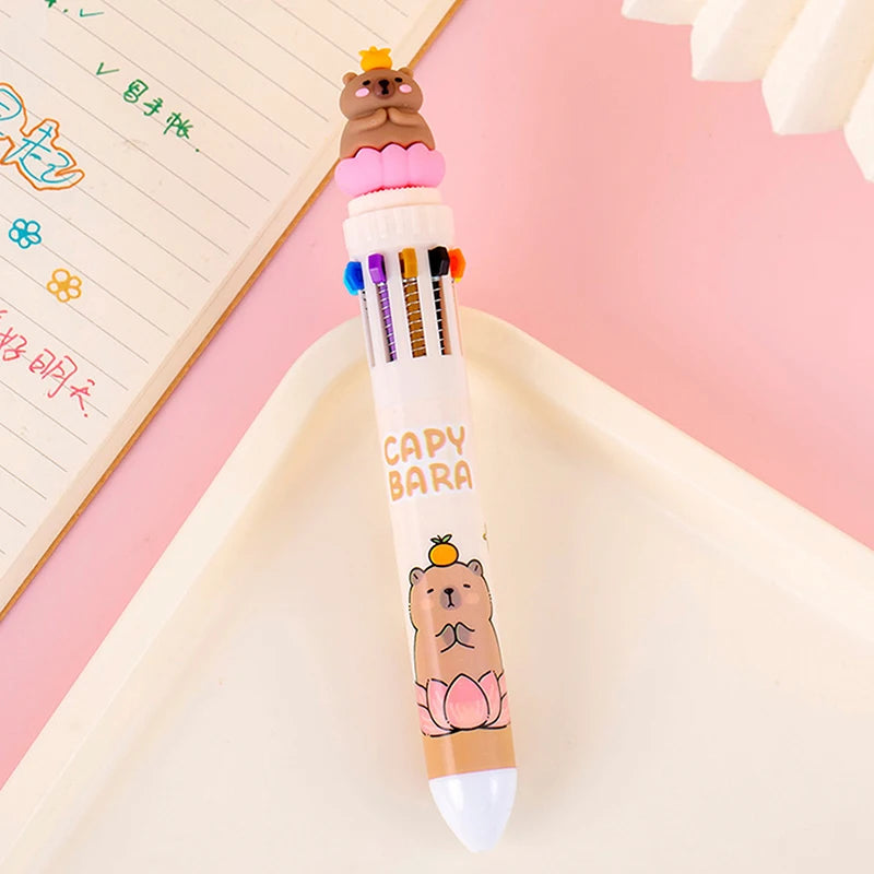 Crayon with kawaii cartoon bear design on a pink background