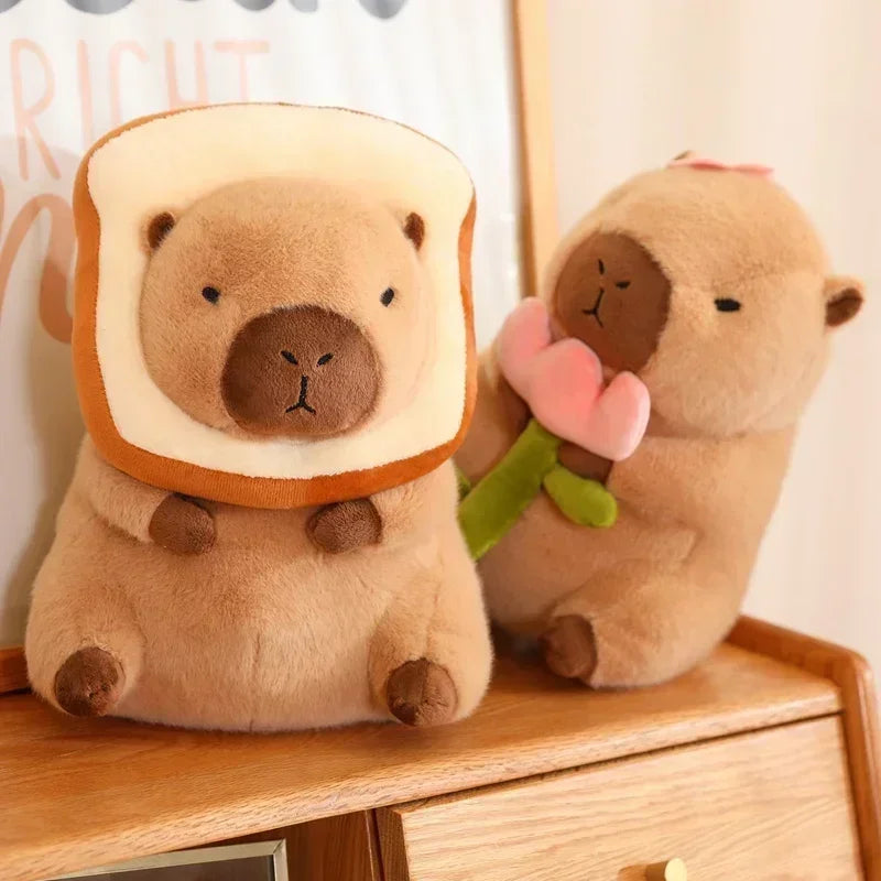 Two plush kawaii toys resembling a bear in a toaster and a bear holding a flower on a wooden surface.