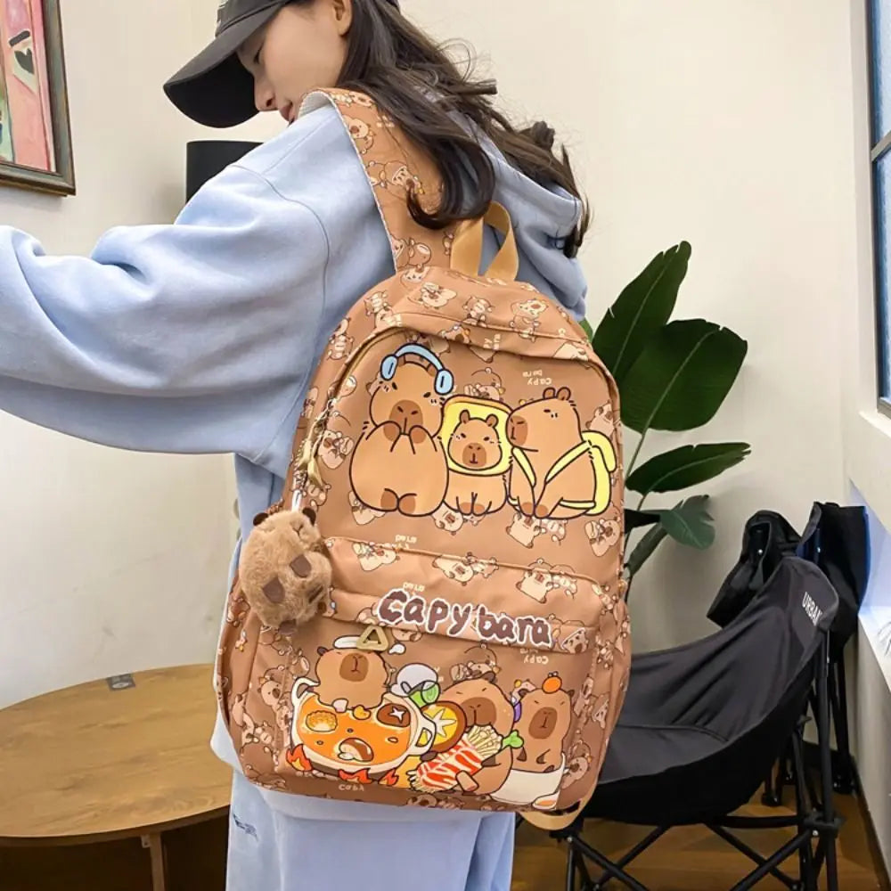Person wearing a Kawaii cartoon-themed backpack indoors