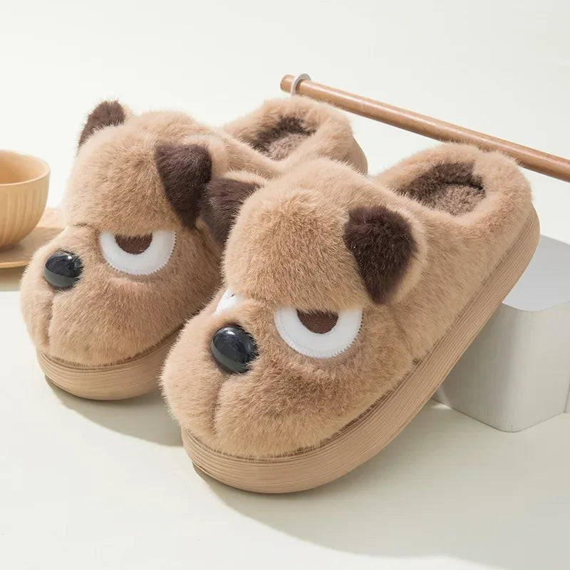Pair of kawaii dog-shaped slippers with a cute design on a light background