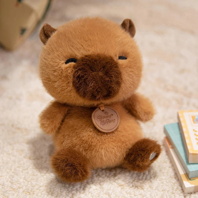 Brown teddy kawaii bear with a tag on a light-colored surface