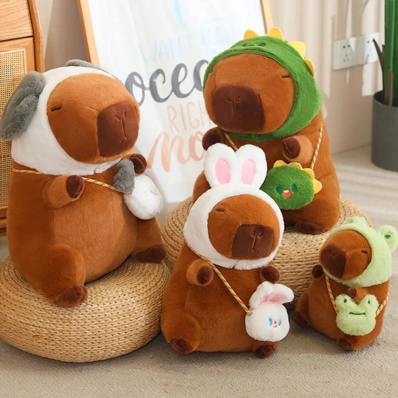 Set of brown kawaii plush toys with animal ears and tails on a beige surface.