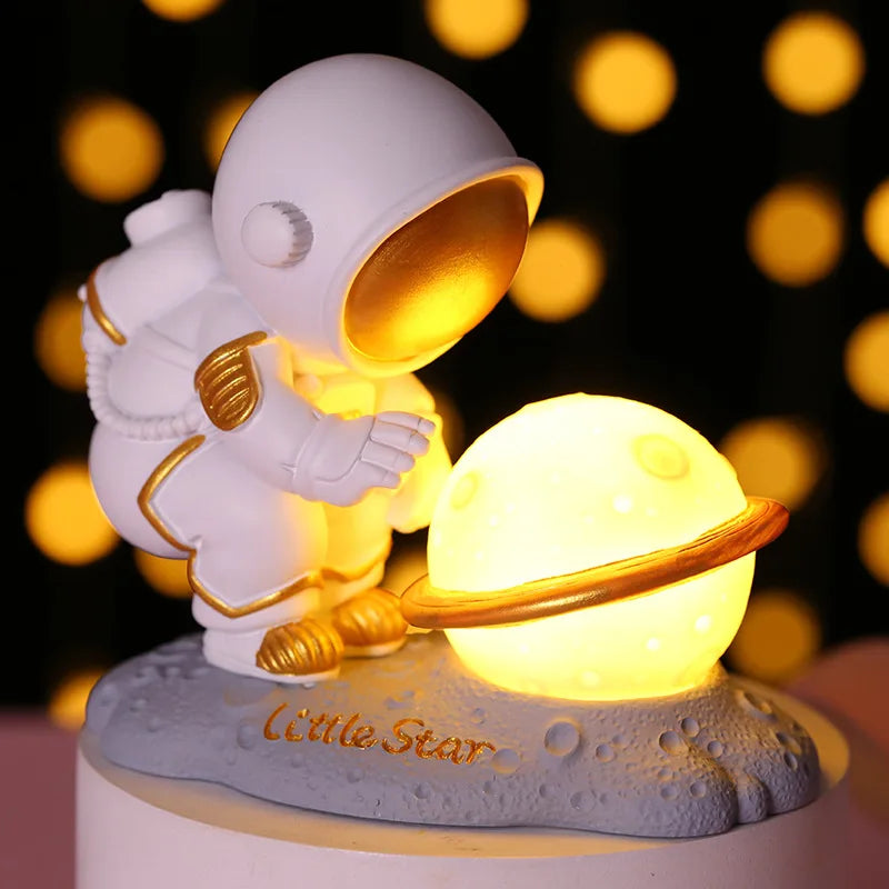 Astronaut kawaii figurine with a glowing moon on a blurred lights background