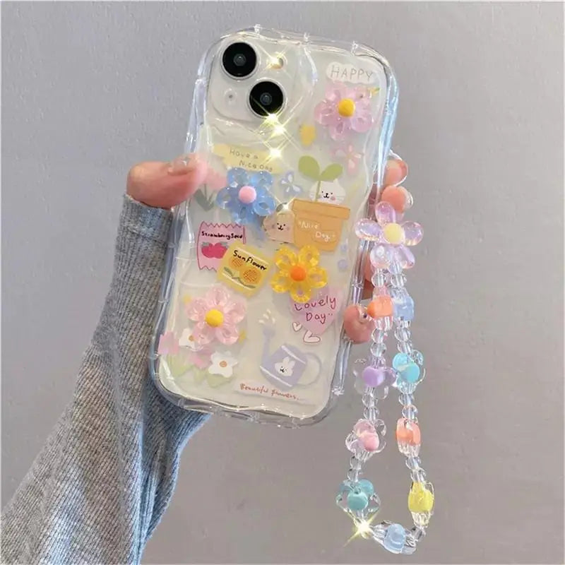Phone case with kawaii floral design and colorful beads on a gray background