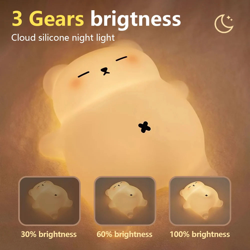 Cloud silicone kawaii night light with three brightness settings on a brown background