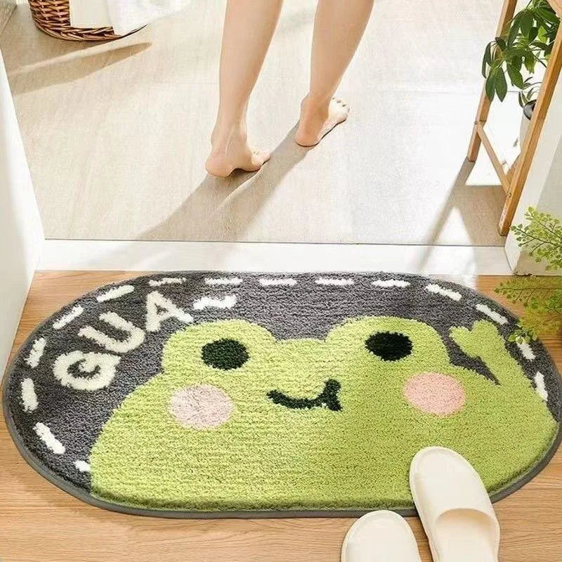 Round Kawaii green frog rug with 'GUA' text on a wooden floor.