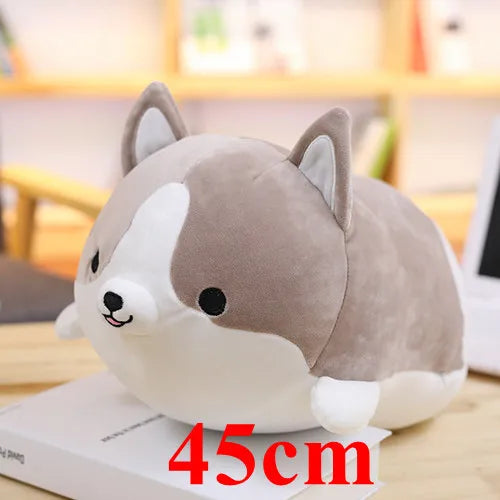 Plush dog kawaii toy with '45cm' text on a blurred indoor background
