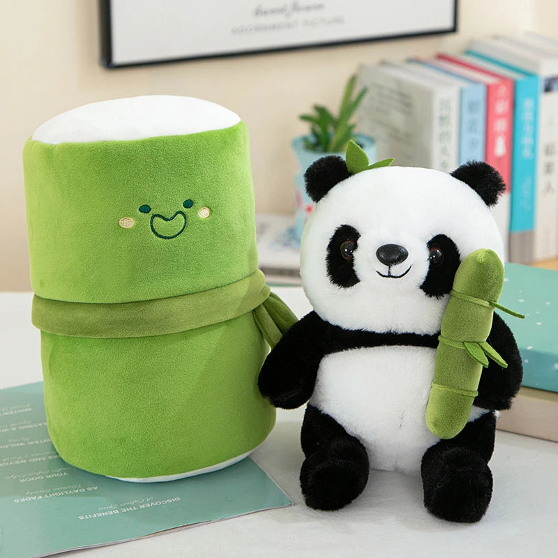 Green kawaii plush container with a face and a panda plush toy holding a bamboo stick on a surface.