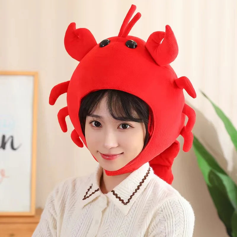 Person wearing a kawaii red crab-themed hat indoors