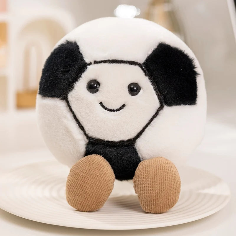 Plush kawaii toy panda on a white plate with a blurred background